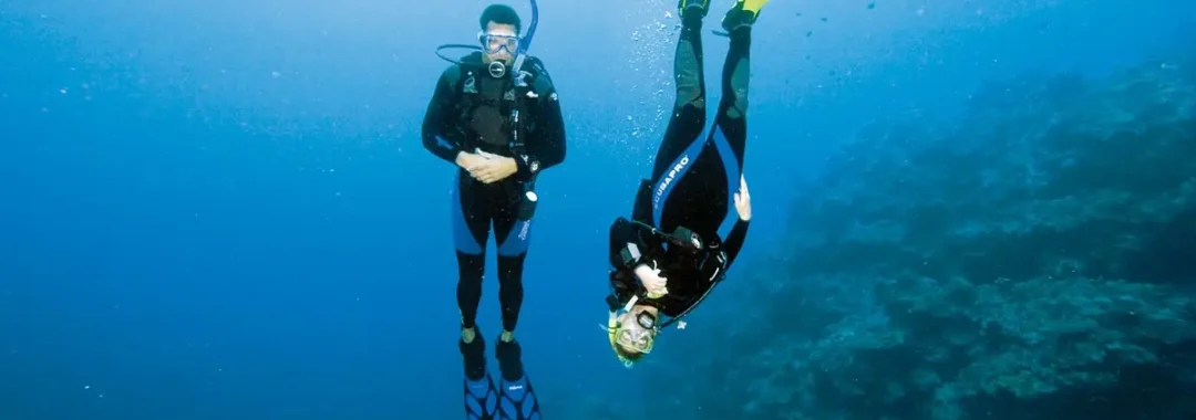 Divers practising buoyancy and positioning during professional level training